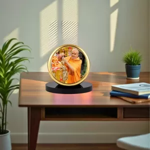 Car Dashboard/Table Top Mahant Swami Maharaj Metal Golden Photo Stand 2x2 Inches, Compact & Stylish Spiritual Display For Car, Home & Office (Pack Of 1) (F24513) Car Dashboard/Table Top Mahant Swami Maharaj Metal Golden Photo Stand 2x2 Inches, Compact & Stylish Spiritual Display For Car, Home & Office (Pack Of 1) (F24513)