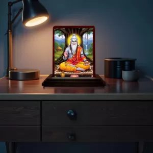 Car Desk/Table Top Shri Veda Vyasa Wooden Photo Stand 3x4 Inches, Compact & Stylish Spiritual Display For Car, Home & Office (Pack Of 1) (F14270) Car Desk/Table Top Shri Veda Vyasa Wooden Photo Stand 3x4 Inches, Compact & Stylish Spiritual Display For Car, Home & Office (Pack Of 1) (F14270)