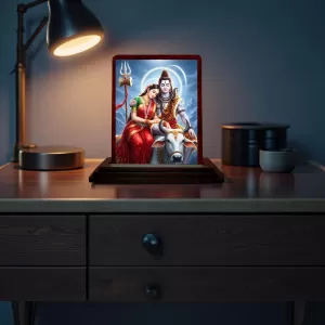 Car Desk/Table Top Lord Shiva And Parvathi Wooden Photo Stand 3x4 Inches, Compact & Stylish Spiritual Display For Car, Home & Office (Pack Of 1) (F14327) Car Desk/Table Top Lord Shiva And Parvathi Wooden Photo Stand 3x4 Inches, Compact & Stylish Spiritual Display For Car, Home & Office (Pack Of 1) (F14327)