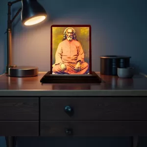 Car Desk/Table Top Swami Sri Yukteswar Giri Wooden Photo Stand 3x4 Inches, Compact & Stylish Spiritual Display For Car, Home & Office (Pack Of 1) (F14635) Car Desk/Table Top Swami Sri Yukteswar Giri Wooden Photo Stand 3x4 Inches, Compact & Stylish Spiritual Display For Car, Home & Office (Pack Of 1) (F14635)