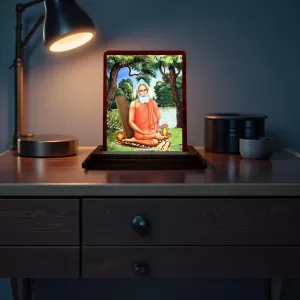 Car Desk/Table Top Baba Lokenath Wooden Photo Stand 3x4 Inches, Compact & Stylish Spiritual Display For Car, Home & Office (Pack Of 1) (F14636) Car Desk/Table Top Baba Lokenath Wooden Photo Stand 3x4 Inches, Compact & Stylish Spiritual Display For Car, Home & Office (Pack Of 1) (F14636)