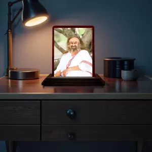 Car Desk/Table Top Shri Shri Ravi Shankar Ji Wooden Photo Stand 3x4 Inches, Compact & Stylish Spiritual Display For Car, Home & Office (Pack Of 1) (F14650) Car Desk/Table Top Shri Shri Ravi Shankar Ji Wooden Photo Stand 3x4 Inches, Compact & Stylish Spiritual Display For Car, Home & Office (Pack Of 1) (F14650)