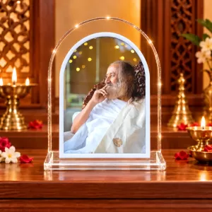 Sri Sri Ravi Shankar L Shape Acrylic Showpiece 3 X 3.5 Inch For Home, Office And Car (F176017) Sri Sri Ravi Shankar L Shape Acrylic Showpiece 3 X 3.5 Inch For Home, Office And Car (F176017)