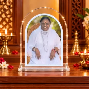 Maa Amritanandamayi L Shape Acrylic Showpiece 3 X 3.5 Inch For Home, Office And Car (F176502) Maa Amritanandamayi L Shape Acrylic Showpiece 3 X 3.5 Inch For Home, Office And Car (F176502)