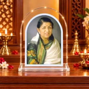 Lata Mangeshkar L Shape Acrylic Showpiece 3 X 3.5 Inch For Home, Office And Car (F177531) Lata Mangeshkar L Shape Acrylic Showpiece 3 X 3.5 Inch For Home, Office And Car (F177531)