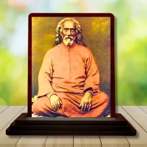 Car Desk/Table Top Swami Sri Yukteswar Giri Wooden Photo Stand 3x4 Inches, Compact & Stylish Spiritual Display For Car, Home & Office (Pack Of 1) (F14635) Car Desk/Table Top Swami Sri Yukteswar Giri Wooden Photo Stand 3x4 Inches, Compact & Stylish Spiritual Display For Car, Home & Office (Pack Of 1) (F14635)