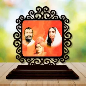 Car Desk/Table Top Ramakrishna Paramahamsa And Sarada Devi Wooden Photo Stand 3x4 Inches, Compact & Stylish Spiritual Display For Car, Home & Office (Pack Of 1) (F19910) Car Desk/Table Top Ramakrishna Paramahamsa And Sarada Devi Wooden Photo Stand 3x4 Inches, Compact & Stylish Spiritual Display For Car, Home & Office (Pack Of 1) (F19910)
