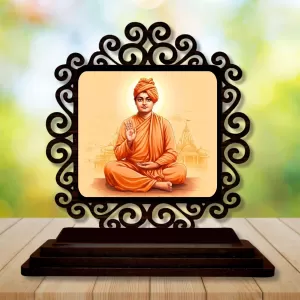Car Desk/Table Top Swami Vivekananda Wooden Photo Stand 3x4 Inches, Compact & Stylish Spiritual Display For Car, Home & Office (Pack Of 1) (F19931) Car Desk/Table Top Swami Vivekananda Wooden Photo Stand 3x4 Inches, Compact & Stylish Spiritual Display For Car, Home & Office (Pack Of 1) (F19931)